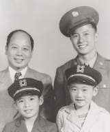 Members of the Jue Family. Top L-R: Walton Jue (1909-1994) immigrated from Canton, China : 1922. Opened National Market in 1927 where Ventura County Museum of History and Art is now located. Opened Jue's Market, Santa Cruz and Main Streets, Ventura : 1946. Tony Jue in uniform (has store in Los Angeles). Bottom L-R: Allen Jue, Edward Jue (both work in Main Street market. Allen is also Chairman of the Board of Directors, American Commercial Bank, Ventura) : about 1944.