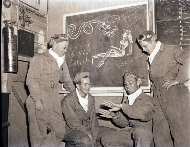 Cadets talking in the ready room, with pin-up doodle, Hancock College of Aeronautics